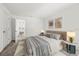 Bright bedroom with a comfortable bed, modern decor, and access to another room at 4206 W North B St # 2, Tampa, FL 33609