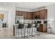 Modern kitchen features granite countertops, stainless steel appliances, and a convenient breakfast bar at 4206 W North B St # 2, Tampa, FL 33609