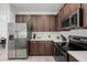Modern kitchen with stainless steel appliances and ample cabinet space, perfect for cooking enthusiasts at 4206 W North B St # 2, Tampa, FL 33609