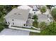 Aerial view of the rear of a two-story home with a white fence and a well-kept backyard at 4206 W North B St # 2, Tampa, FL 33609