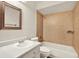 Cozy bathroom with vanity, toilet and tiled shower/tub at 4342 Candler Ave, Spring Hill, FL 34609
