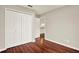 Cozy bedroom with beautiful wood floors and closet at 4342 Candler Ave, Spring Hill, FL 34609