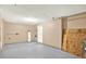 Spacious garage featuring a water heater, and ample room for storage or parking at 4342 Candler Ave, Spring Hill, FL 34609