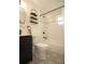 Bathroom with modern black fixtures, decorative tile floor, and updated shower and tub at 4830 47Th N Ave, St Petersburg, FL 33714