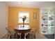 Charming dining area with a view to built-in shelving at 4830 47Th N Ave, St Petersburg, FL 33714