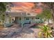 Charming single-story home with a carport and beautifully landscaped front yard at 4830 47Th N Ave, St Petersburg, FL 33714