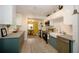 Modern kitchen with sleek cabinets, stainless steel appliances, and an open layout at 4830 47Th N Ave, St Petersburg, FL 33714