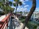 Community boat docks with palm trees and a view of the waterfront at 4851 W Gandy Blvd # B10L30, Tampa, FL 33611