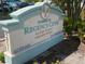 Homes of Regency Cove sign with landscaping at 4851 W Gandy Blvd # B10L30, Tampa, FL 33611