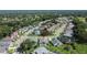 Aerial view showing the property located in a well-maintained neighborhood with manicured lawns and tree lined streets at 5303 Cottonwood Tree Cir, Valrico, FL 33596