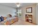 Cozy bedroom with soft lighting and closet, offering a peaceful and organized space at 5303 Cottonwood Tree Cir, Valrico, FL 33596