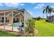 This home boasts a pool, a screened-in lanai, and verdant landscaping, perfect for enjoying the outdoors at 5303 Cottonwood Tree Cir, Valrico, FL 33596