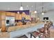 A modern kitchen featuring stainless steel appliances, granite countertops, and an open layout perfect for entertaining at 5303 Cottonwood Tree Cir, Valrico, FL 33596