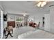 Large main bedroom featuring natural light, ceiling fans, and ample space for relaxation at 5303 Cottonwood Tree Cir, Valrico, FL 33596