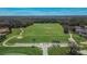 Aerial view of a spacious practice field with manicured lawns, ideal for various activities at 5303 Cottonwood Tree Cir, Valrico, FL 33596