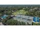 Community tennis courts and swimming pool with stunning views of the golf course at 5303 Cottonwood Tree Cir, Valrico, FL 33596