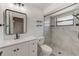 Bright bathroom with stylish vanity, shower, and modern fixtures at 5435 20Th N Ave, St Petersburg, FL 33710