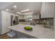 Bright kitchen showcasing white cabinets, stainless steel appliances, and a marble countertop at 5435 20Th N Ave, St Petersburg, FL 33710