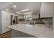 Bright kitchen showcasing white cabinets, stainless steel appliances, and a marble countertop at 5435 20Th N Ave, St Petersburg, FL 33710