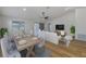 Elegant dining and living area with an open floor plan, showcasing stylish decor and finishes at 5435 20Th N Ave, St Petersburg, FL 33710