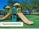 Colorful playground equipment surrounded by greenery at Northwest Park at 5435 20Th N Ave, St Petersburg, FL 33710