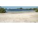 Beachfront property with clear water and sandy shore offers a serene escape at 6009 Sea Ranch Dr # 306, Hudson, FL 34667
