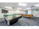 Community game room featuring a pool table, ping pong table, and TV for entertainment at 6009 Sea Ranch Dr # 306, Hudson, FL 34667