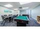 Features a poker table, pool table, and foosball, perfect for entertaining in this lovely game room at 6009 Sea Ranch Dr # 306, Hudson, FL 34667