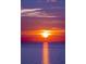 Spectacular sunset over the ocean, displaying vibrant colors and tranquility at 6009 Sea Ranch Dr # 306, Hudson, FL 34667