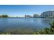 Scenic water view with buildings on the horizon at 6009 Sea Ranch Dr # 306, Hudson, FL 34667