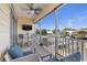 Relax on this screened balcony with views of the boat docks and seating area at 6049 Moorings S Dr, St Petersburg, FL 33712