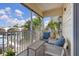 Relaxing screened balcony with water view, features comfortable seating and stylish outdoor decor at 6049 Moorings S Dr, St Petersburg, FL 33712