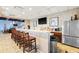 Stylish bar area with ample seating, modern appliances, and an open layout for entertaining at 6049 Moorings S Dr, St Petersburg, FL 33712