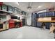Well-organized garage with ample shelving, storage cabinets, and a work area at 6049 Moorings S Dr, St Petersburg, FL 33712