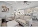 Open layout showcases the living room, dining area, and a modern kitchen with an island at 6049 Moorings S Dr, St Petersburg, FL 33712