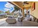 Stylish outdoor space with comfortable seating, a fire pit, and convenient access to the boat dock at 6049 Moorings S Dr, St Petersburg, FL 33712