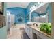 Bright bathroom features a bathtub, separate shower, and a vessel sink at 810 Erik Lake Rd, Brandon, FL 33510