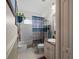 Well-maintained bathroom featuring a shower-tub combo and a vanity with storage at 810 Erik Lake Rd, Brandon, FL 33510