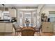 Cozy breakfast nook with bay window offering natural light and scenic views, perfect for casual dining at 810 Erik Lake Rd, Brandon, FL 33510