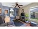 Comfortable living room showcasing a sofa, chair, and a large window view at 810 Erik Lake Rd, Brandon, FL 33510