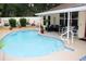 Inviting pool with a lounge area, perfect for relaxation and entertainment at 810 Erik Lake Rd, Brandon, FL 33510