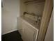 Laundry closet with white washer and dryer at 8517 Island Breeze Ln # 207, Temple Terrace, FL 33637