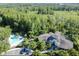 A luxurious pool with comfortable seating area and tropical landscaping is the perfect spot to relax at 8517 Island Breeze Ln # 207, Temple Terrace, FL 33637