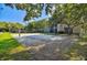 Sand volleyball court with the community building in the background at 8517 Island Breeze Ln # 207, Temple Terrace, FL 33637
