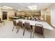 Large, versatile event space with tables and chairs for gatherings at 952 Virginia St # 303, Dunedin, FL 34698