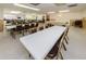 Expansive event space with rows of tables and chairs at 952 Virginia St # 303, Dunedin, FL 34698