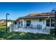 Outdoor patio with multiple seating areas, showcasing community living at 952 Virginia St # 303, Dunedin, FL 34698
