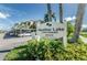 Heather Lake Condominiums sign, showcasing the community's name and contact information at 952 Virginia St # 303, Dunedin, FL 34698