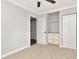 Bedroom with closet, built-in drawers and door to bath at 111 Carlyle Dr, Palm Harbor, FL 34683