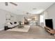 A bright, open living room with bar seating at 111 Carlyle Dr, Palm Harbor, FL 34683